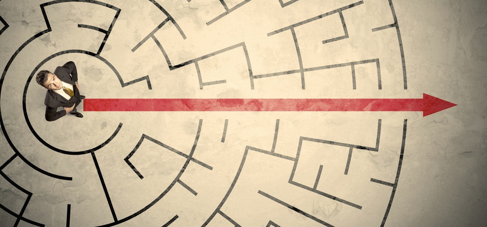 Bild eines Mannes in einem Labyrinth